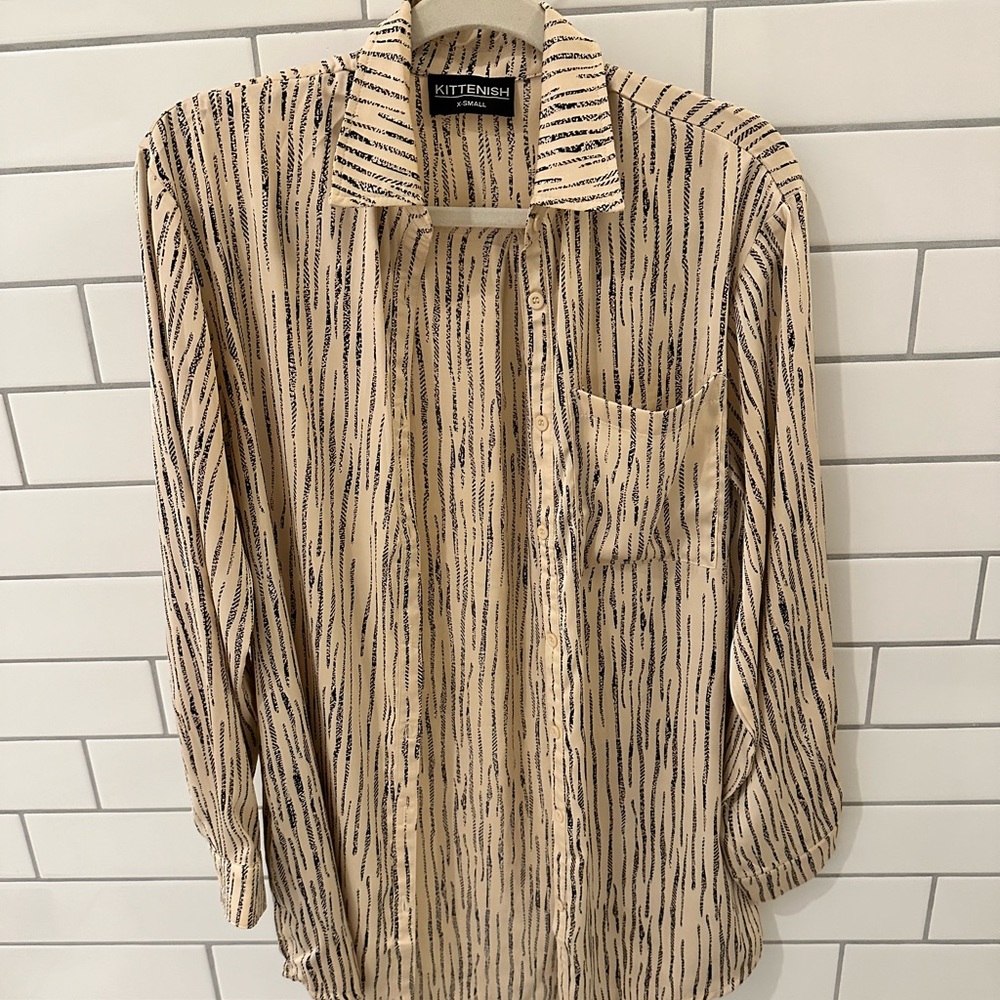 Kittenish stumbling oversized long sleeve shirt.